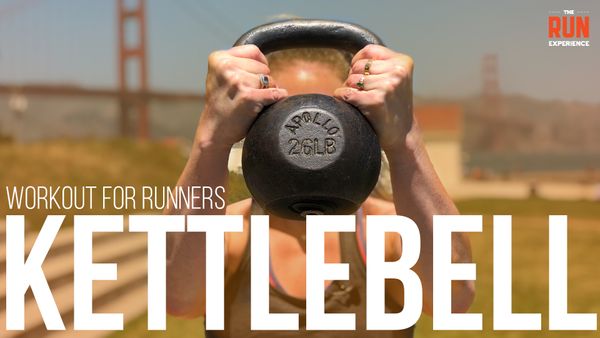 Coach Holly holding a kettlebell