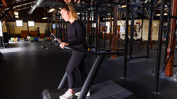 woman running on treadmill