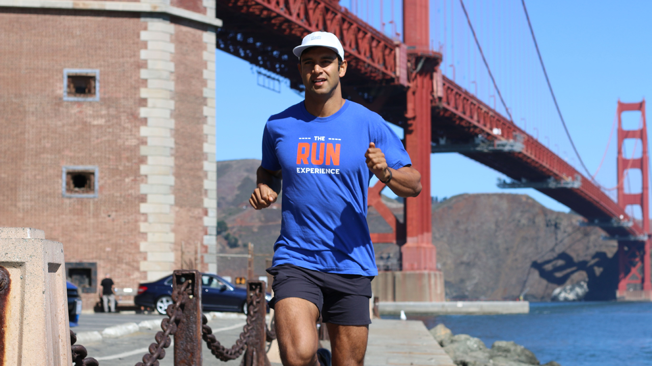 Man running near bridge